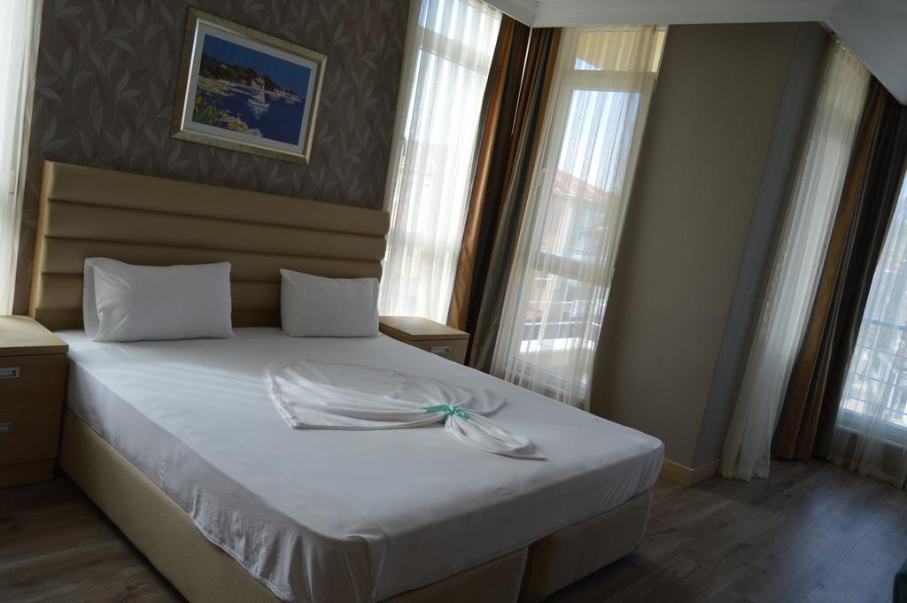 Kale Palace Hotel İmroz Bagian luar foto