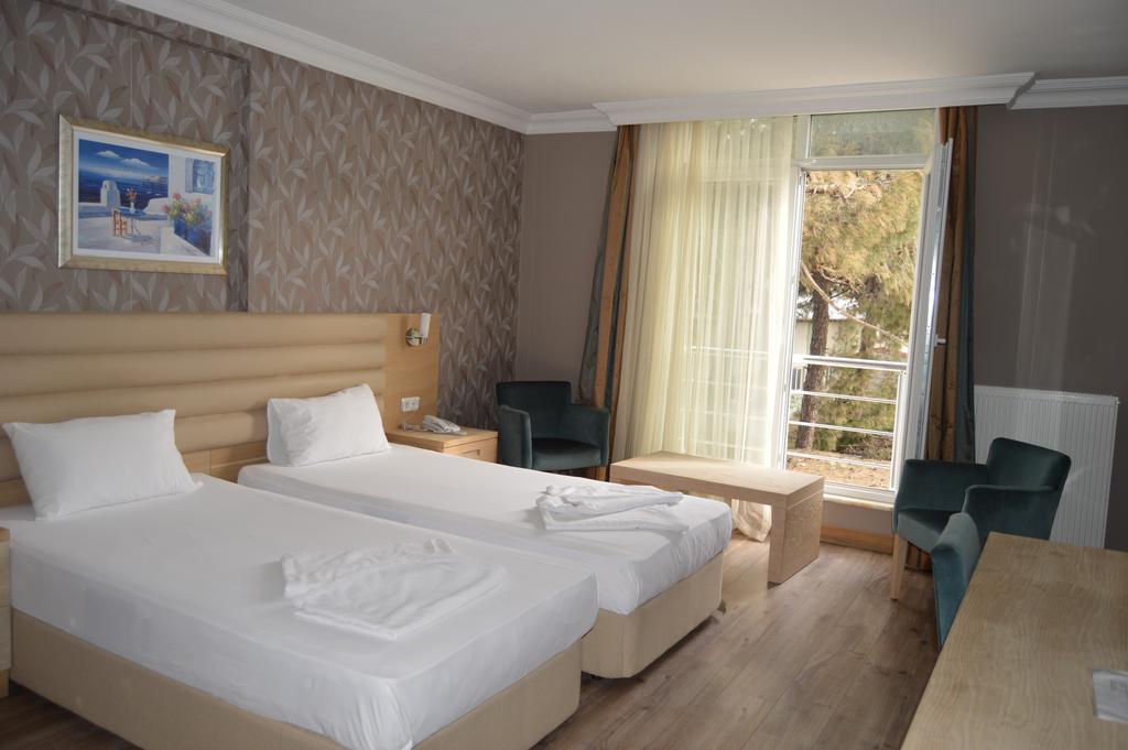 Kale Palace Hotel İmroz Bagian luar foto